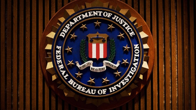 A crest of the Federal Bureau of Investigation is seen 03 August 2007 inside the J. Edgar Hoover FBI Building in Washington, DC.