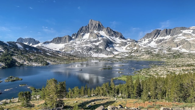 Thousand Island Lake,Scenic view of lake and snowcapped mountains against blue sky,California,United States,USA - stock photo Juan Melli / 500px via Getty Images