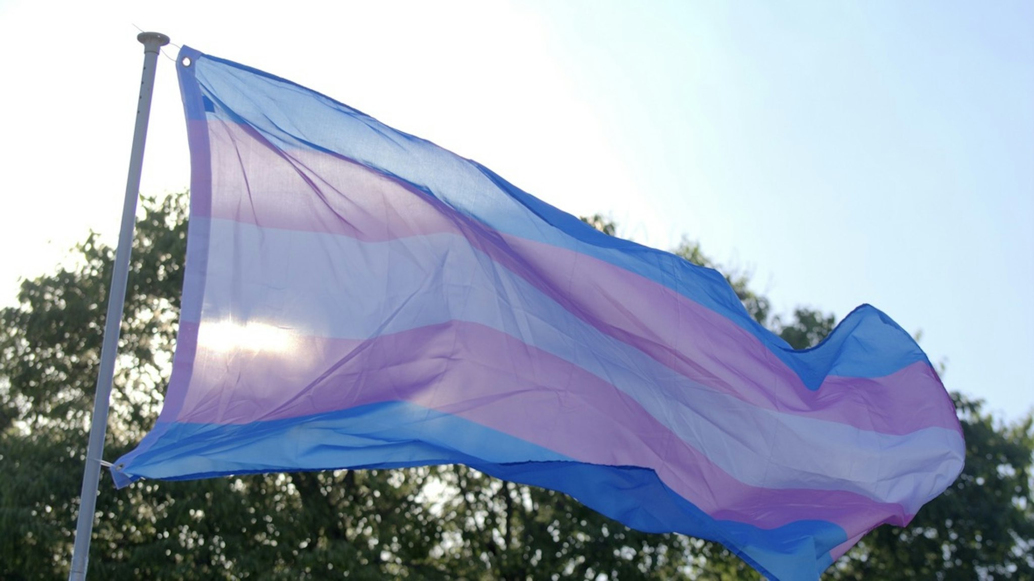 Transgender flag - stock photo Transgender flag in the LGTB Pride Parade in Valencia ( spain Miguel Sotomayor via Getty Images