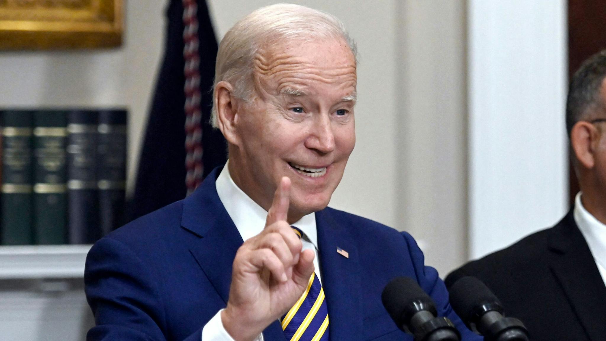 US-politics-BIDEN-education-debt US President Joe Biden announces student loan relief with Education Secretary Miguel Cardona (R) on August 24, 2022 in the Roosevelt Room of the White House in Washington, DC. - Biden announced that most US university graduates still trying to pay off student loans will get $10,000 of relief to address a decades-old headache of massive educational debt across the country.