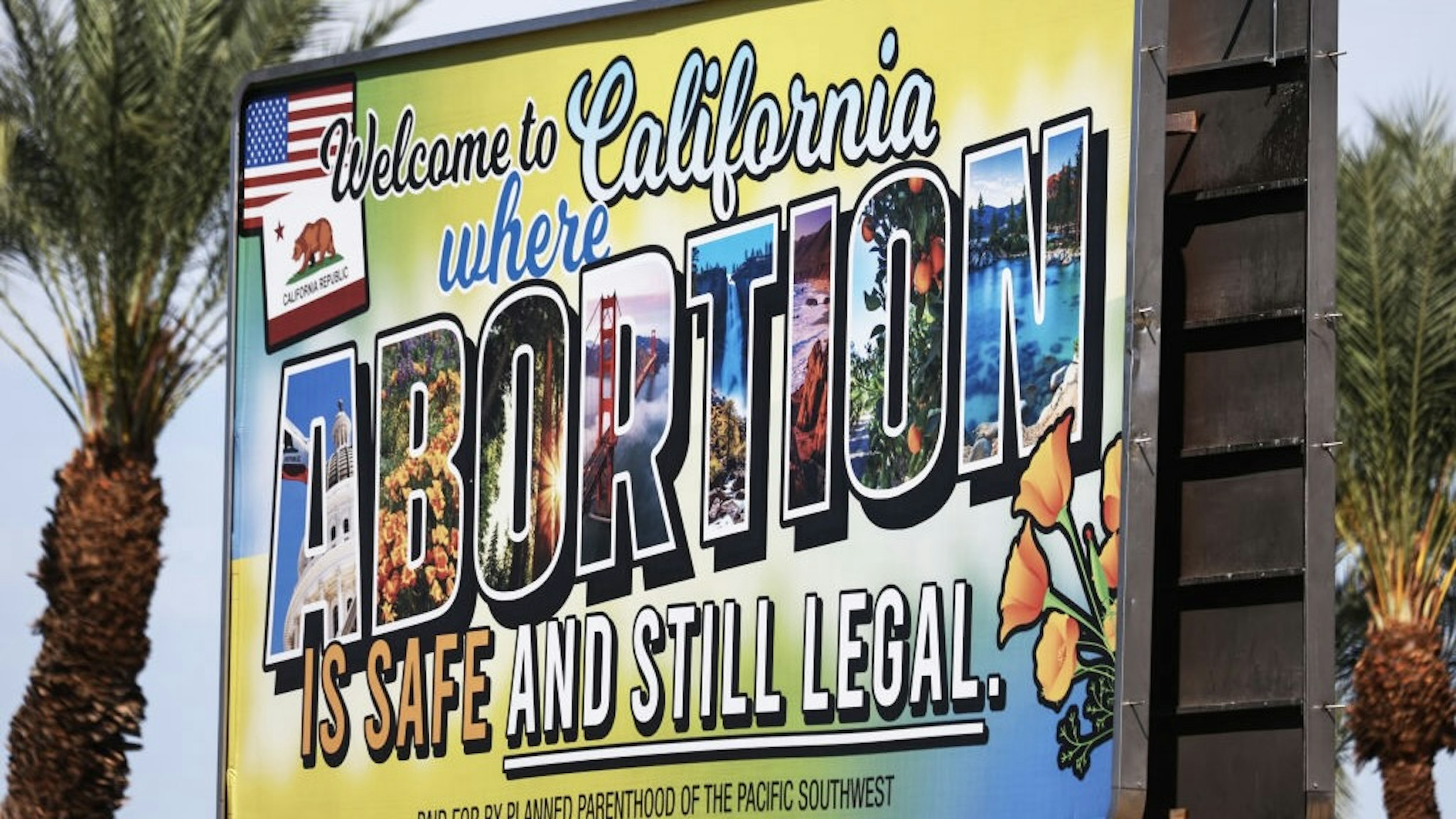 Billboard In California Promotes State's Legal Abortion Access RANCHO MIRAGE, CALIFORNIA - JULY 12: A billboard reads, 'Welcome to California where abortion is safe and still legal' on July 12, 2022 in Rancho Mirage, California. The billboard was paid for by Planned Parenthood of the Pacific Southwest. The number of patients from outside states increased 900 percent at Planned Parenthood clinics in San Bernardino and Orange counties the week following the Supreme Court's decision in the Dobbs v Jackson Women's Health case. The decision overturned the landmark 50-year-old Roe v Wade case and erased a federal right to an abortion. (Photo by Mario Tama/Getty Images) Mario Tama / Staff