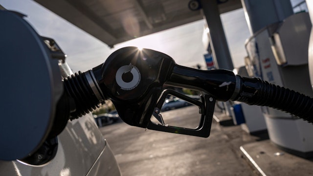 A fuel nozzle in a vehicle at a gas station in Sacramento, California, U.S., on Thursday, March 24, 2022
