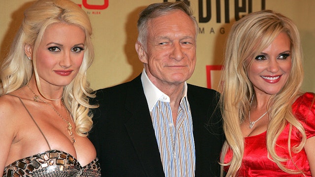 Model Holly Madison, Hugh Hefner and model Bridget Marquardt at the LA Direct Magazine Holiday Party at Le Deux Nightclub in Hollywood, California on December 13, 2007.