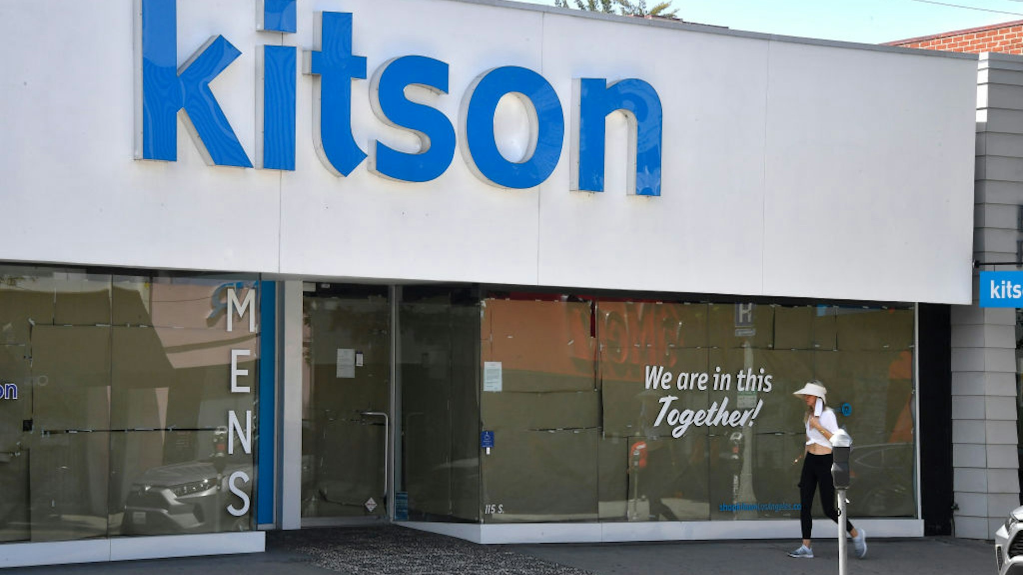 LOS ANGELES, CALIFORNIA - APRIL 22: A view of Kitson Store on Robertson displaying a message on their window during the COVID-19 lockdown on April 22, 2020 in Beverly Hills, California.