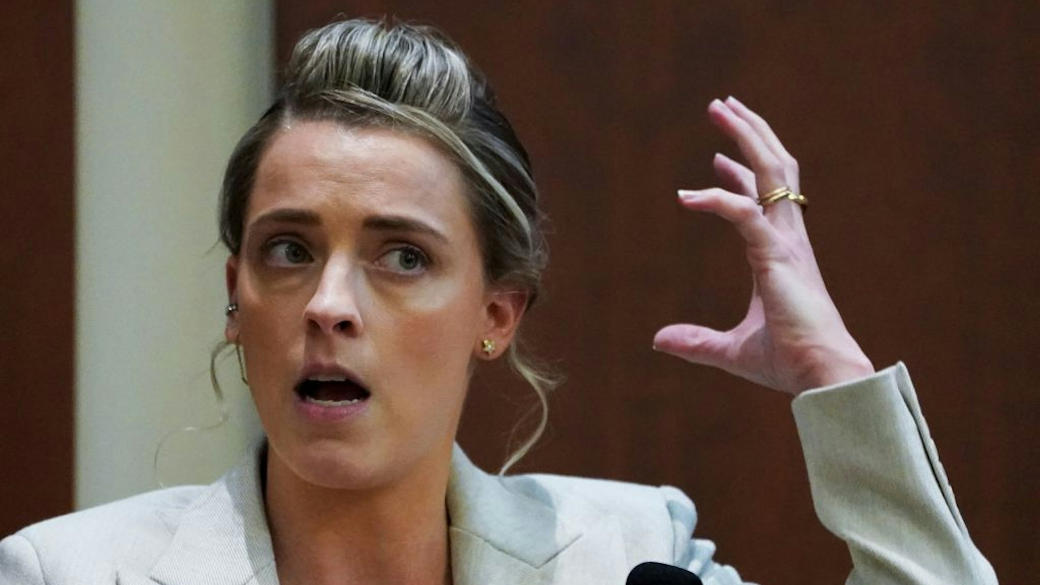 Whitney Henriquez, sister of Actor Amber Heard, testifies on the stand during Johnny Depp's defamation trial against ex-wife Amber Heard at the Fairfax County Circuit Courthouse in Fairfax, on May 18, 2022.