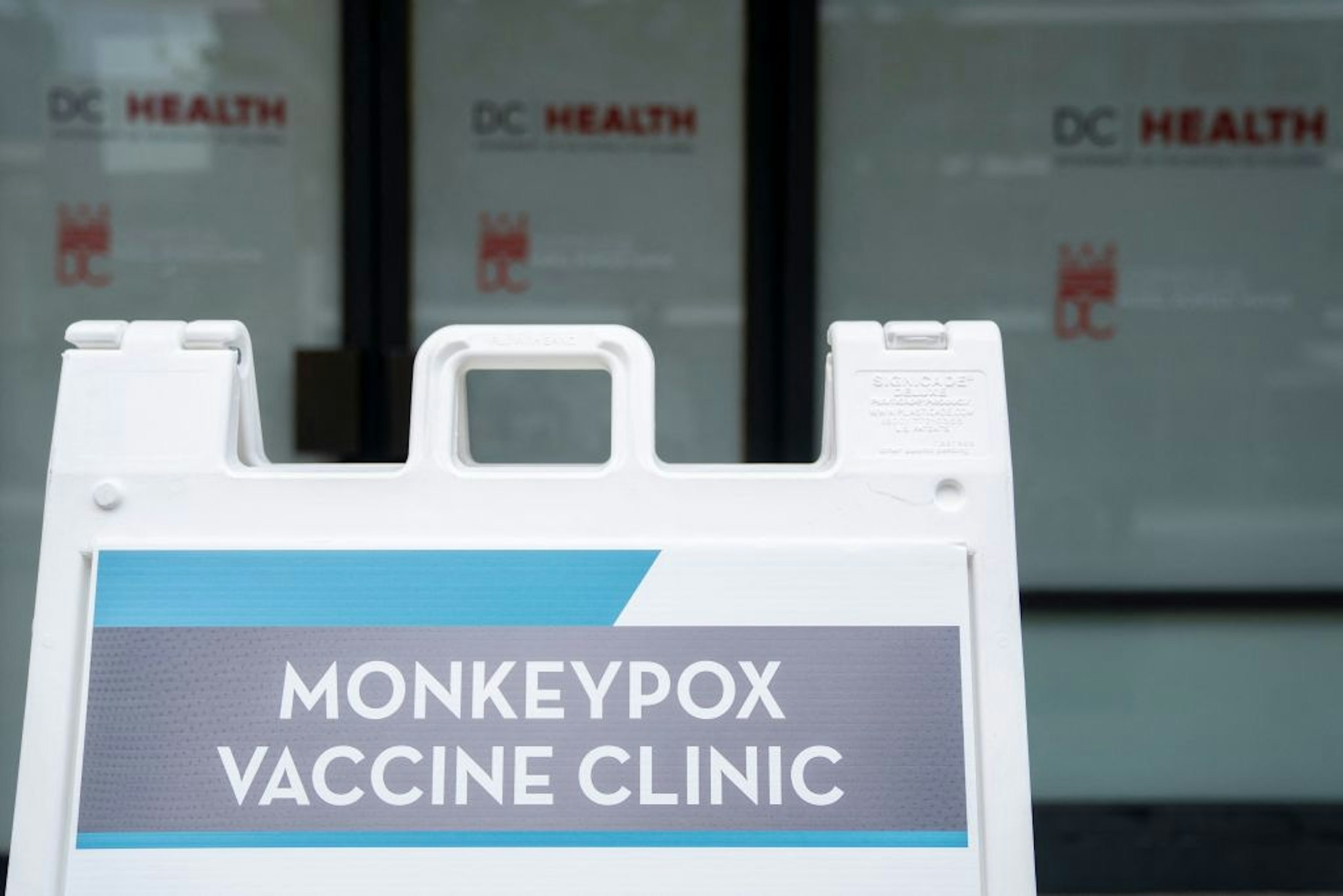 This photo taken on August 5, 2022 shows a sign for a Monkeypox vaccine clinic in Washington, DC. - US President Joe Biden's government on August 4 declared monkeypox a public health emergency, a move that should free up new funds, assist in data gathering and allow the deployment of additional personnel in the fight against the disease. (Photo by Stefani Reynolds / AFP) (Photo by STEFANI REYNOLDS/AFP via Getty Images)