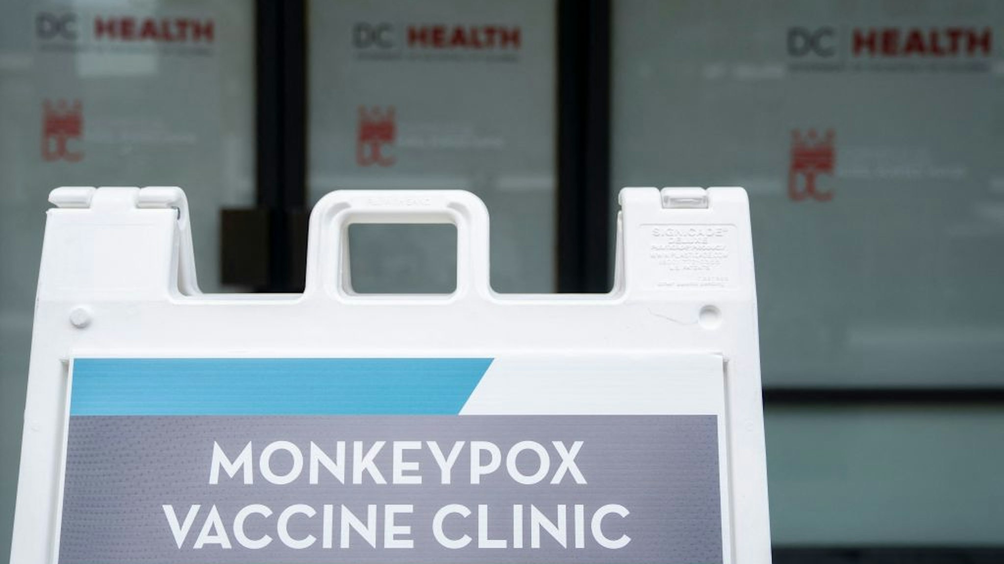 This photo taken on August 5, 2022 shows a sign for a Monkeypox vaccine clinic in Washington, DC. - US President Joe Biden's government on August 4 declared monkeypox a public health emergency, a move that should free up new funds, assist in data gathering and allow the deployment of additional personnel in the fight against the disease. (Photo by Stefani Reynolds / AFP) (Photo by STEFANI REYNOLDS/AFP via Getty Images)