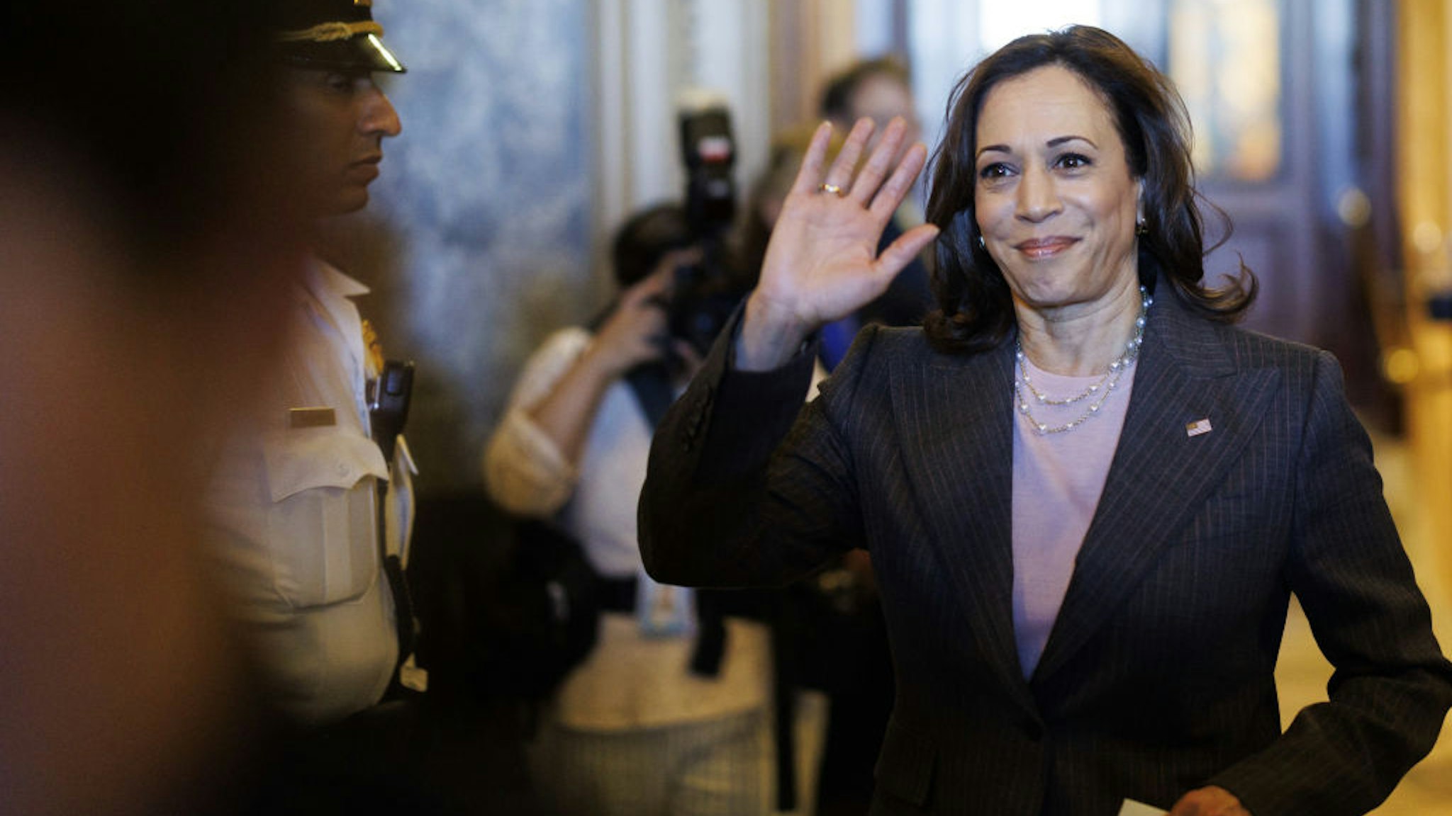 US Vice President Kamala Harris walks through the US Capitol building in Washington, D.C., US, on Sunday, Aug. 7, 2022. The Senate passed a landmark tax, climate and health-care bill, speeding a slimmed-down version of President Joe Biden's domestic agenda on a path to becoming law after a year of Democratic infighting that the White House was unable to control. Photographer: Ting Shen/Bloomberg via Getty Images