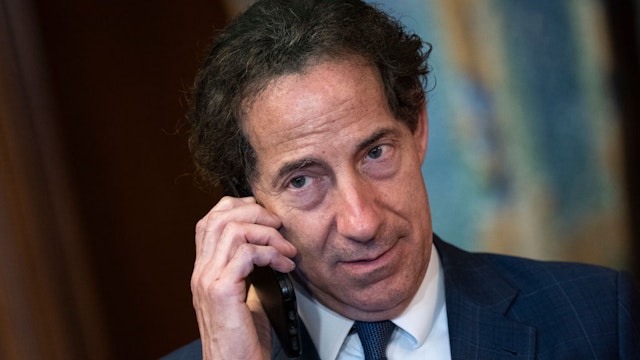 WASHINGTON, DC - AUGUST 12: Rep. Jamie Raskin (D-MD) talks on the phone as House Democrats wait for Speaker of the House Nancy Pelosi (D-CA) to sign the Inflation Reduction Act during a bill enrollment ceremony after the House passed the legislation at the U.S. Capitol August 12, 2022 in Washington, DC. The $737 billion legislation will focus on slowing climate change, lower health care costs and creating clean energy jobs by enacting a 15% corporate minimum tax, a 1% fee on stock buybacks and enhancing IRS enforcement. (Photo by Drew Angerer/Getty Images)