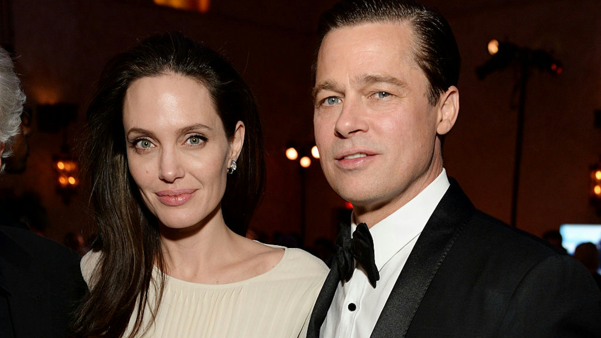 HOLLYWOOD, CA - NOVEMBER 05: Writer-director-producer-actress Angelina Jolie Pitt (L) and actor-producer Brad Pitt attend the after party for the opening night gala premiere of Universal Pictures' "By the Sea" during AFI FEST 2015 presented by Audi at TCL Chinese 6 Theatres on November 5, 2015 in Hollywood, California. (Photo by Michael Kovac/Getty Images for AFI)