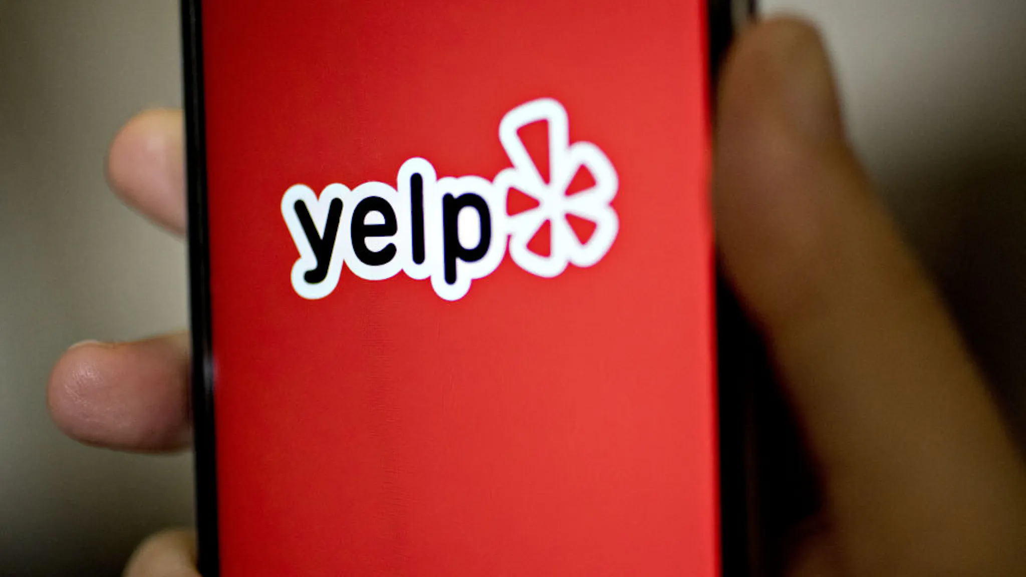 Yelp Inc. Application Ahead Of Earnings Figures The Yelp Inc. application is displayed on for a photograph an Apple Inc. iPhone in Washington, D.C., U.S., on Saturday, Oct. 28, 2017. Yelp Inc. is scheduled to release earnings figures on November 1. Photographer: Andrew Harrer/Bloomberg via Getty Images