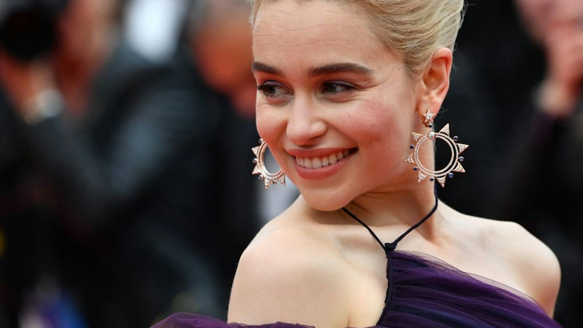 British actress Emilia Clarke poses as she arrives on May 15, 2018 for the screening of the film "Solo : A Star Wars Story" at the 71st edition of the Cannes Film Festival in Cannes, southern France. (Photo by Alberto PIZZOLI / AFP) (Photo credit should read ALBERTO PIZZOLI/AFP via Getty Images)