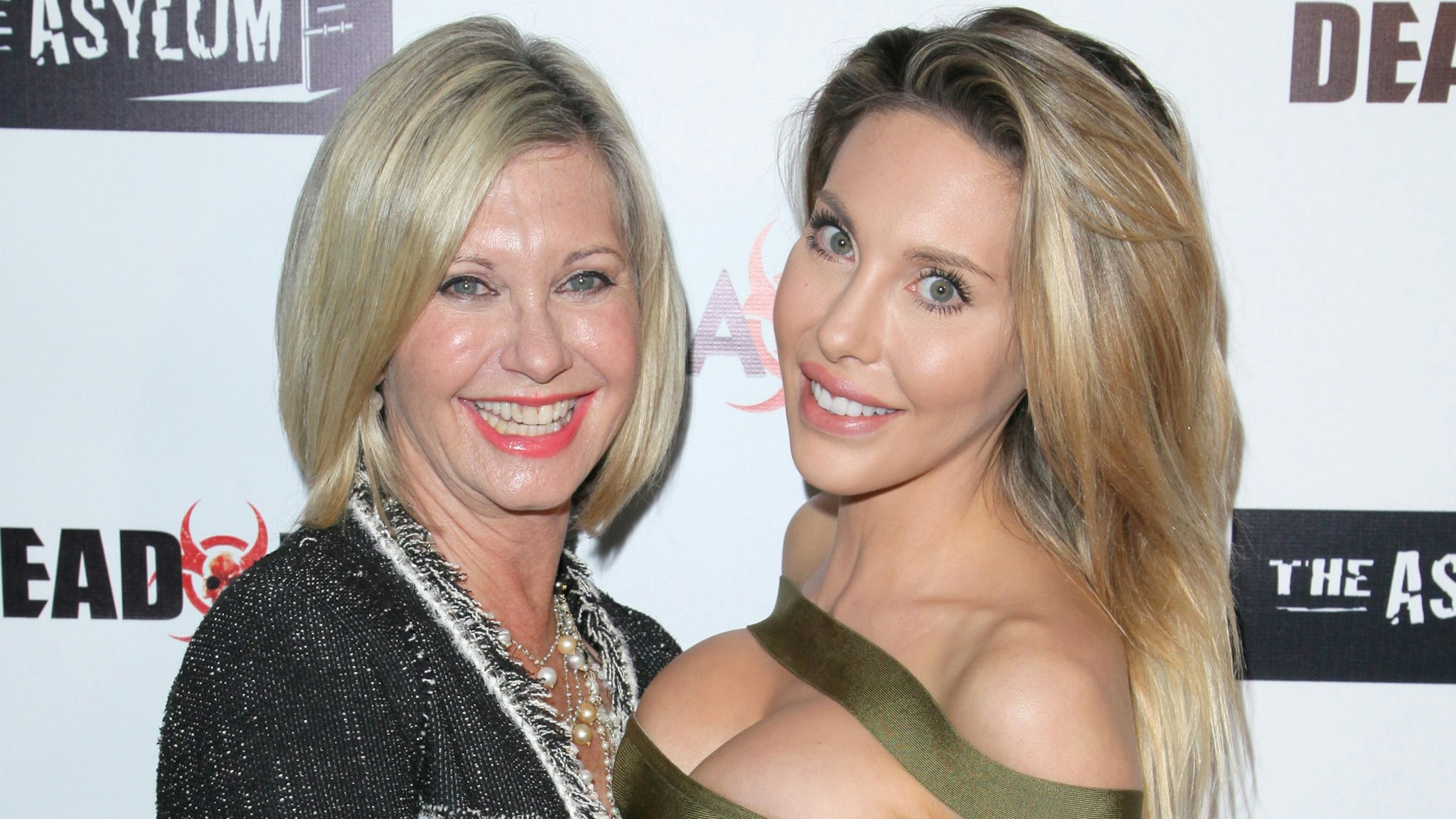 LOS ANGELES, CALIFORNIA - APRIL 01: Singer Olivia Newton-John and her daughter Chloe Lattanzi on the red carpet for the Premiere of Syfy's "Dead 7" at Harmony Gold on April 1, 2016 in Los Angeles, California.