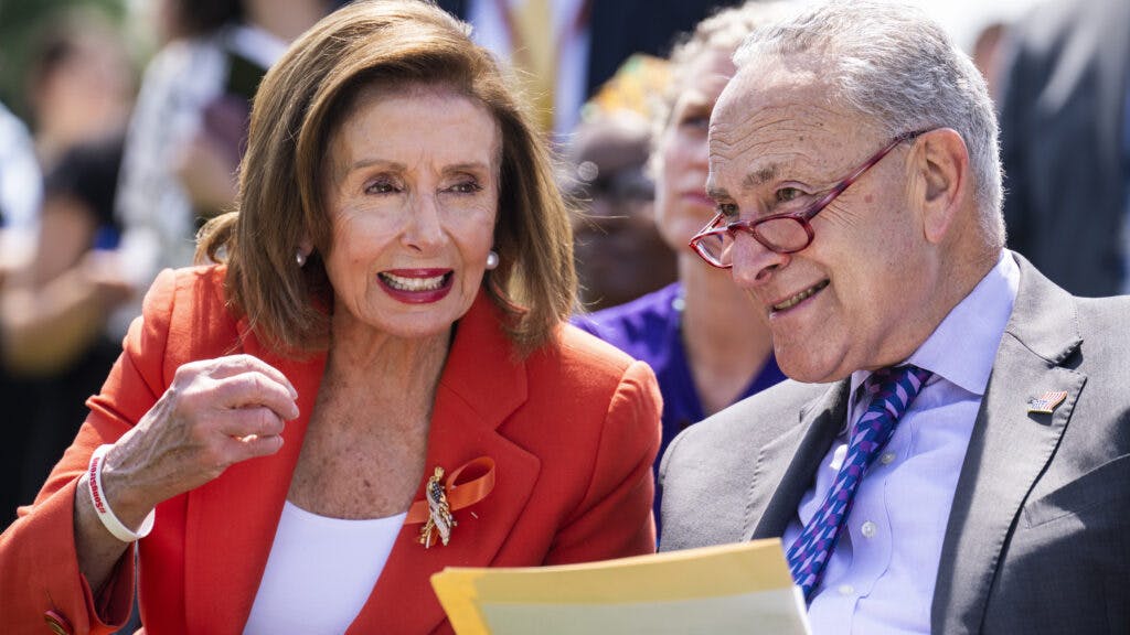 UNITED STATES - JUNE 8: Speaker of the House Nancy Pelosi and Senate Majority Leader Charles Schumer, D-N.Y., attend a rally at Union Square along 3rd Street NW, with gun safety advocates to call for congressional action on the issue in the wake of recent mass shooting in the U.S. on Wednesday, June 8, 2022.
