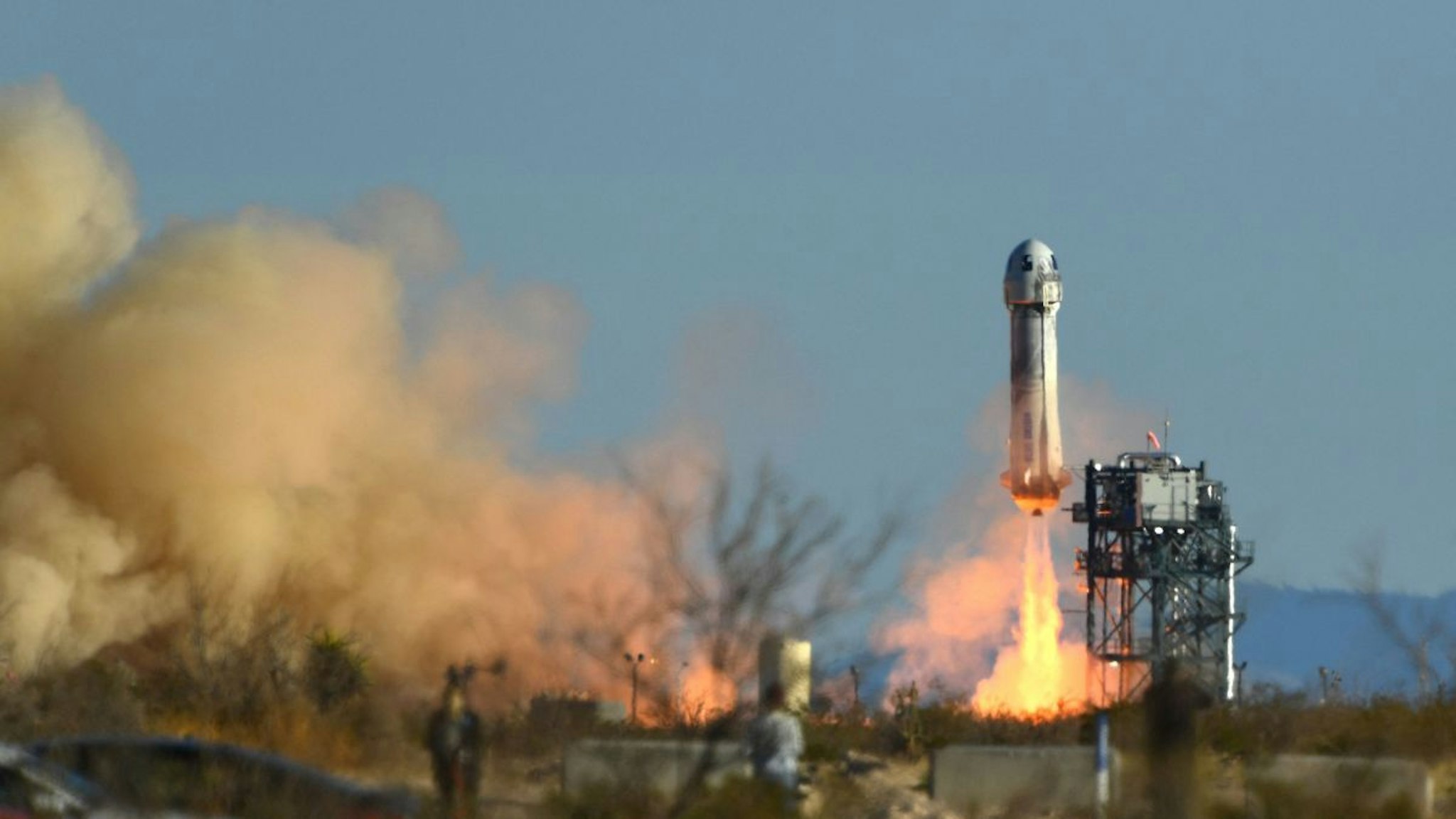 A Blue Origin New Shepard rocket launches from Launch Site One in West Texas north of Van Horn on March 31, 2022.