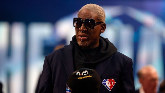 Dennis Rodman reacts after being introduced as part of the NBA 75th Anniversary Team during the 2022 NBA All-Star Game at Rocket Mortgage Fieldhouse on February 20, 2022 in Cleveland, Ohio.