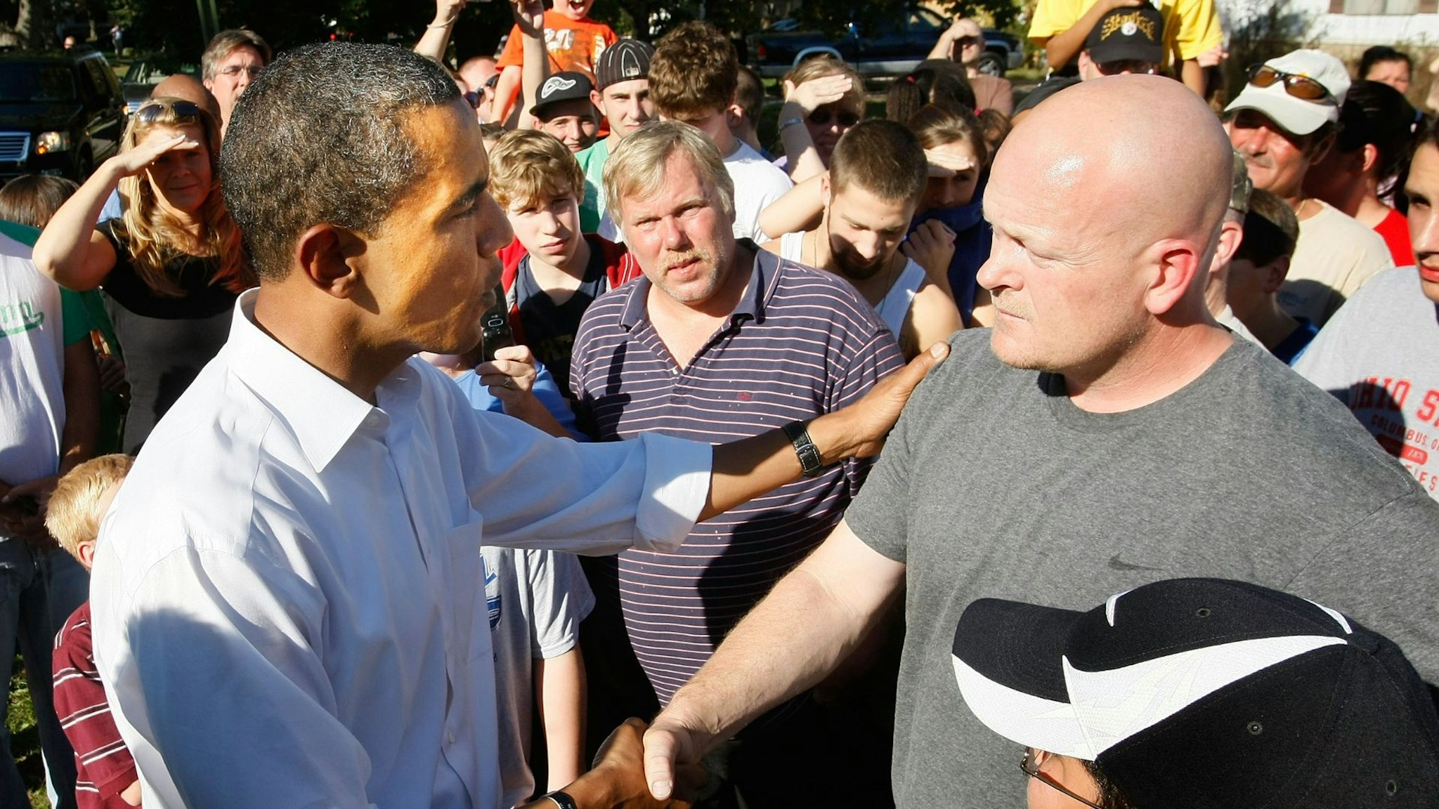 HOLLAND, OH- OCTOBER 12: Democratic presidential nominee U.S. Sen. Barack Obama (D-IL) shakes hands with Joe Wurzelbacher a plumber by trade as he canvasses a neighborhood October 12, 2008 in Holland, Ohio.