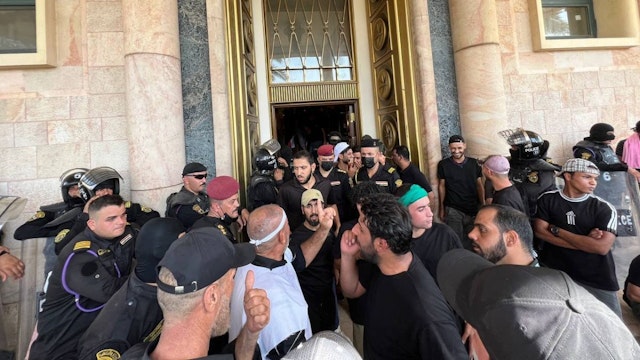 Supporters of Iraqi cleric Muqtada al-Sadr enter Presidential Palace at Green Zone after Muqtada al-Sadr announces his total withdrawal from politics in Baqhdad, Iraq on August 29, 2022.