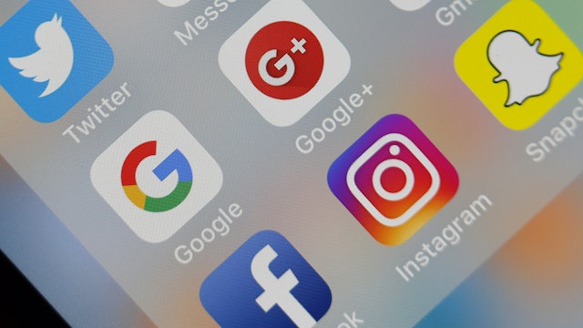 In this photo illustration, the social medias applications logos, Twitter, Google, Google+, Gmail, Facebook, Instagram and Snapchat are displayed on the screen of an Apple iPhone on October 08, 2018 in Paris, France.