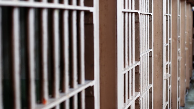 Jail bars - stock photo Soft focused prison bars. naphtalina via Getty Images