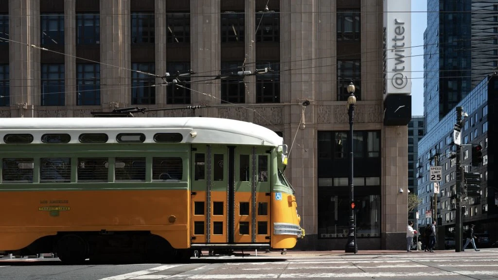 US-INTERNET-MERGER-TWITTER-MUSK A streetcar goes past the Twitter headquarters on April 26, 2022 in downtown San Francisco, California. - Billionaire Elon Musk is capturing a social media prize with his deal to buy Twitter, which has become a global stage for companies, activists, celebrities, politicians and more. (Photo by Amy Osborne / AFP) (Photo by AMY OSBORNE/AFP via Getty Images) AMY OSBORNE / Contributor