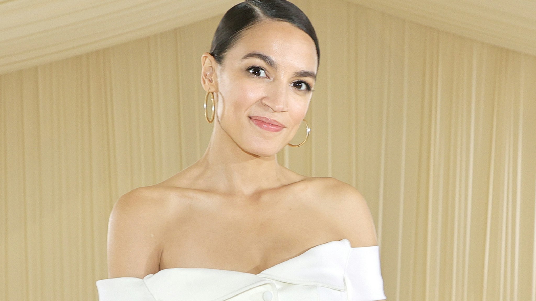 Alexandria Ocasio-Cortez departs The 2021 Met Gala Celebrating In America: A Lexicon Of Fashion at Metropolitan Museum of Art on September 13, 2021 in New York City.