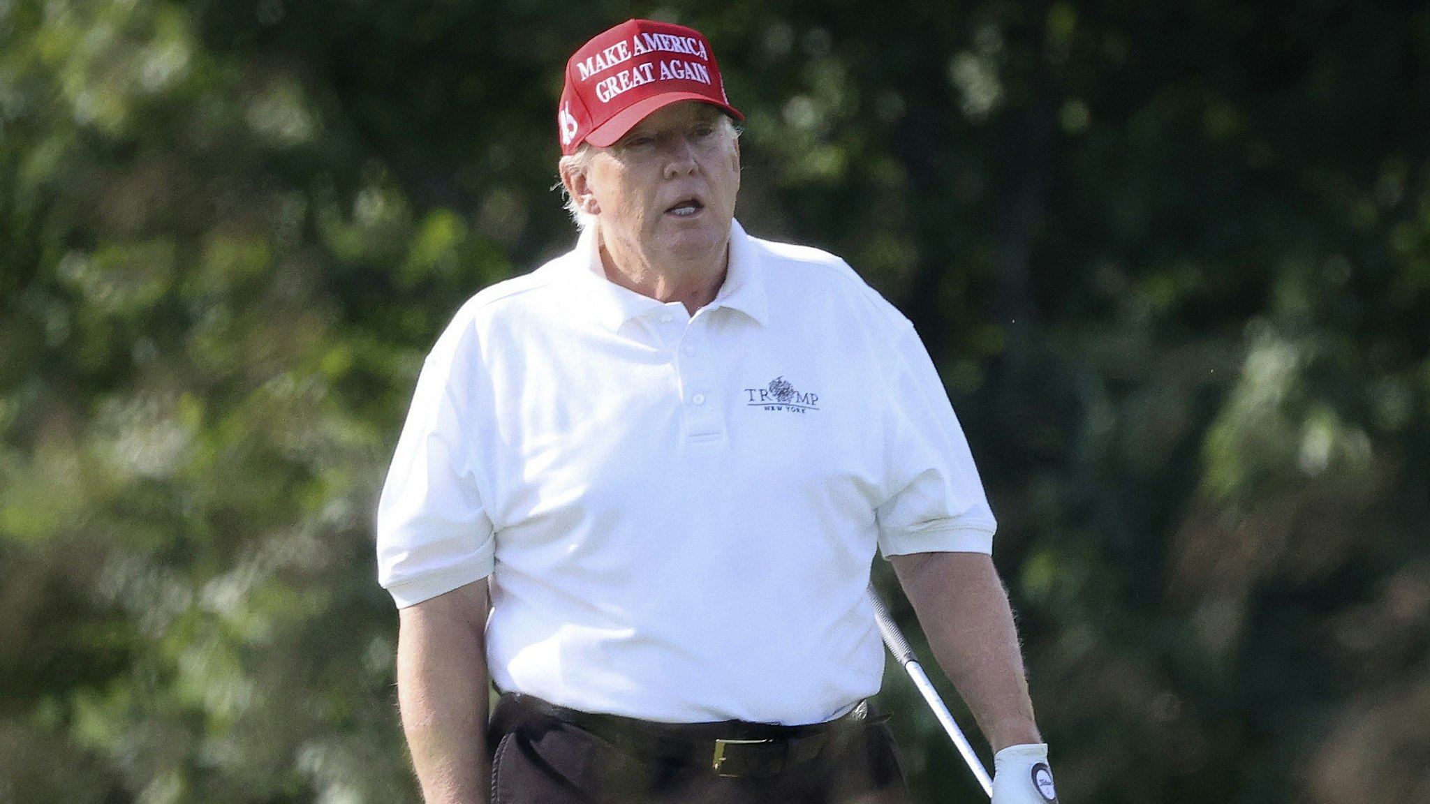 STERLING, VIRGINIA - SEPTEMBER 13: Former U.S. President Donald Trump golfs at Trump National Golf Club September 13, 2022 in Sterling, Virginia. Trump's legal team is currently negotiating with the Justice Department regarding the selection of a Special Master to review documents seized when the FBI searched Mar-a-Lago.