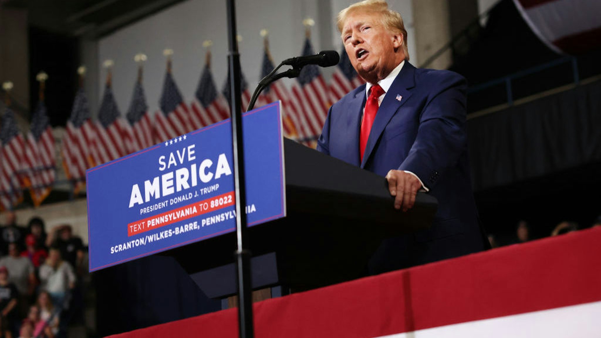 WILKES-BARRE, PENNSYLVANIA - SEPTEMBER 03: Former president Donald Trump speaks to supporters at a rally to support local candidates on September 03, 2022 in Wilkes-Barre, Pennsylvania. Trump still denies that he lost the election against President Joe Biden and has encouraged his supporters to doubt the election process. Trump has backed Senate candidate Mehmet Oz and gubernatorial hopeful Doug Mastriano. (Photo by Spencer Platt/Getty Images)