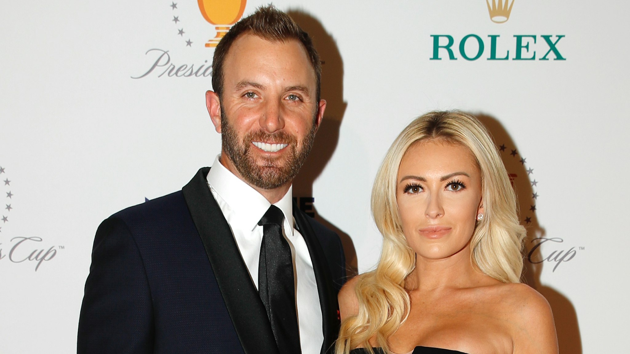 U.S. Team Dustin Johnson with his girlfriend Paulina Gretzky, pose on the red carpet at the Presidents Cup Gala at Crown Towers rior to Presidents Cup at The Royal Melbourne Golf Club on December 10, 2019, in Melbourne, Australia.