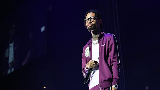 LOS ANGELES, CALIFORNIA - JUNE 22: PnB Rock performs onstage at the STAPLES Center Concert Sponsored By Sprite during BET Experience at Staples Center on June 22, 2019 in Los Angeles, California.