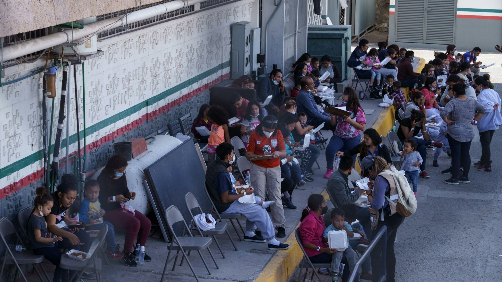 Migrants that crossed into the United States in the Rio Grande Valley and were flown to El Paso, Texas, rest at the Instituto Nacional de Migracion after being expelled to Mexico in Ciudad Juarez.