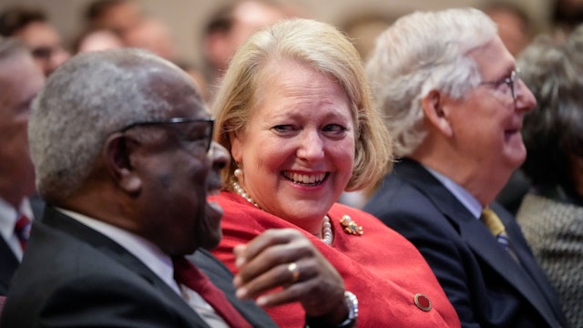 WASHINGTON, DC - OCTOBER 21: (L-R) Associate Supreme Court Justice Clarence Thomas sits with his wife and conservative activist Virginia Thomas while he waits to speak at the Heritage Foundation on October 21, 2021 in Washington, DC. Clarence Thomas has now served on the Supreme Court for 30 years. He was nominated by former President George H. W. Bush in 1991 and is the second African-American to serve on the high court, following Justice Thurgood Marshall. (Photo by Drew Angerer/Getty Images)