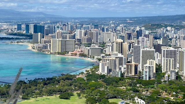 Panoramic view of Waikiki Beach and Honolulu, Hawaii as seen from the Summit of Diamond Head Crater on February 20, 2022.