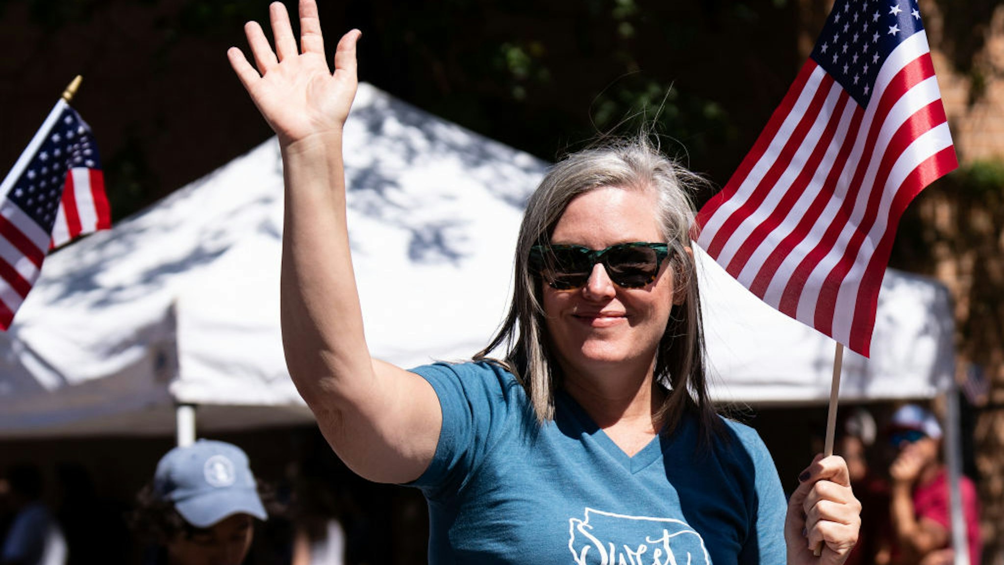 UNITED STATES - JULY 4: Katie Hobbs, Arizona Secretary of State and candidate for governor, waves during the Flagstaff Chamber of Commerce Fourth of July Parade in Flagstaff, Ariz., on Monday, July 4, 2022. (Bill Clark/CQ-Roll Call, Inc via Getty Images)