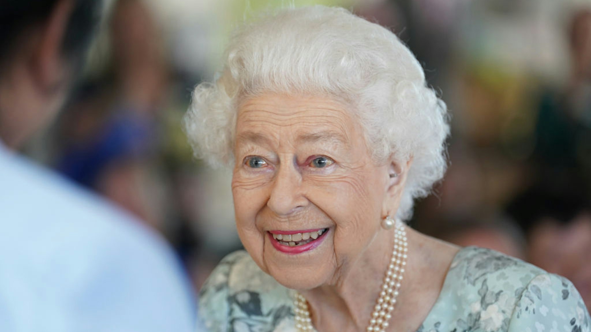 MAIDENHEAD, ENGLAND - JULY 15: Queen Elizabeth II smiles during a visit to officially open the new building at Thames Hospice on July 15, 2022 in Maidenhead, England. (Photo by Kirsty O'Connor-WPA Pool/Getty Images)