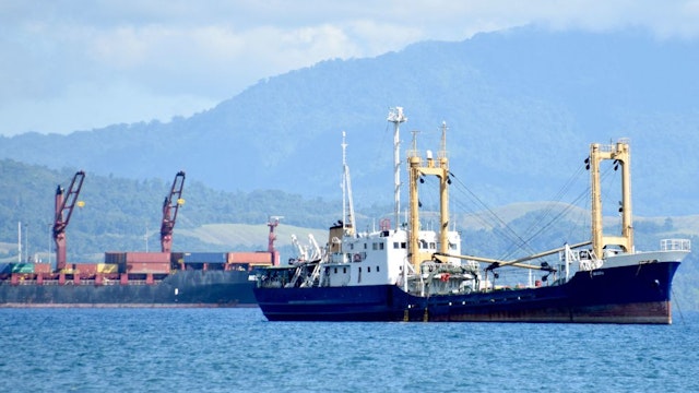 This picture taken on August 30, 2022, shows ships anchored near the Honiara port of Solomons Island. - A snap ban on foreign military vessels docking in Solomon Islands applies to "all countries in the world", a spokesman for the Pacific nation's prime minister told AFP on August 31, 2022. (Photo by Charley PIRINGI / AFP)