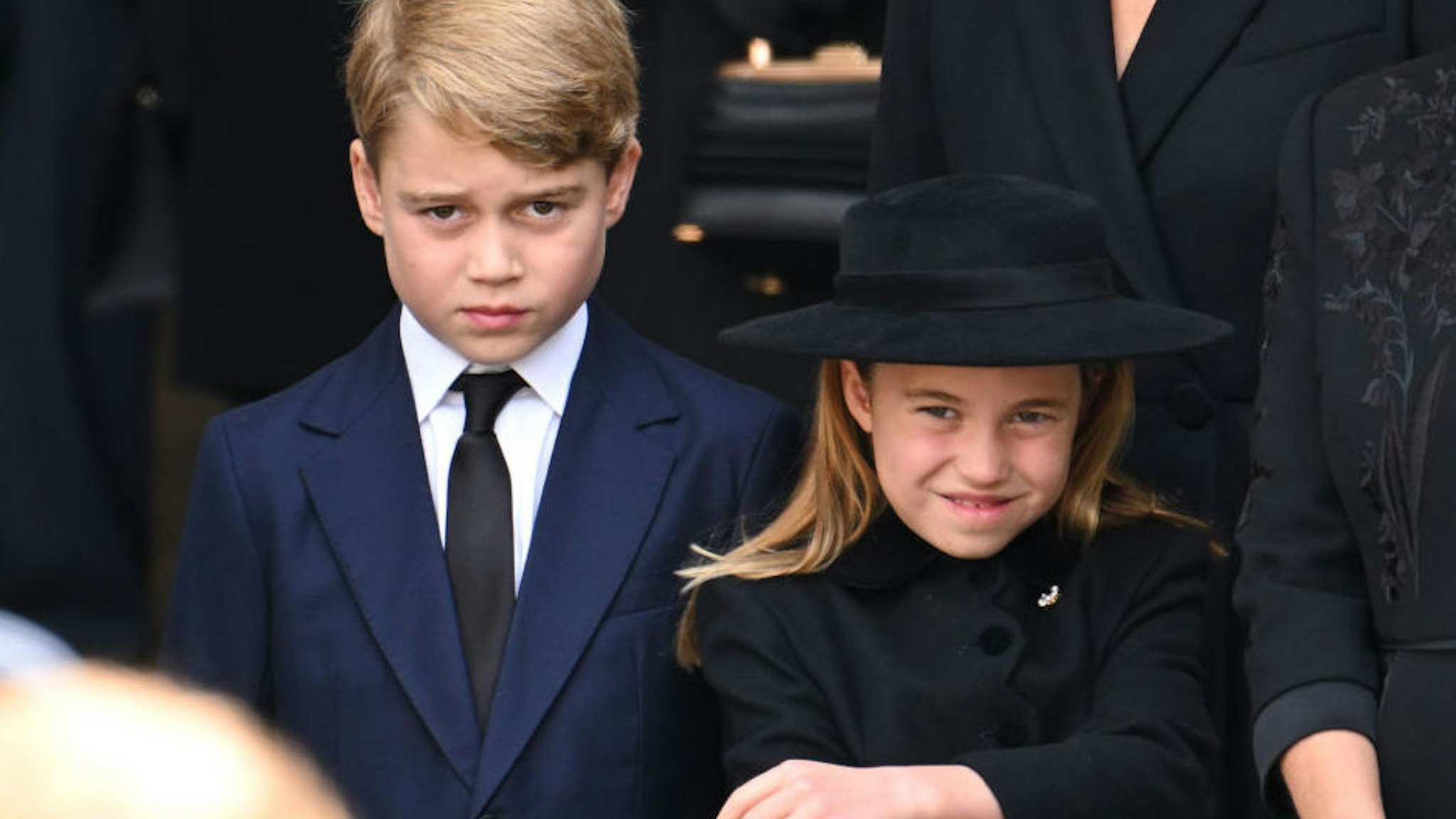 Prince George of Wales and Princess Charlotte of Wales during the State Funeral of Queen Elizabeth II at Westminster Abbey on September 19, 2022 in London, England.
