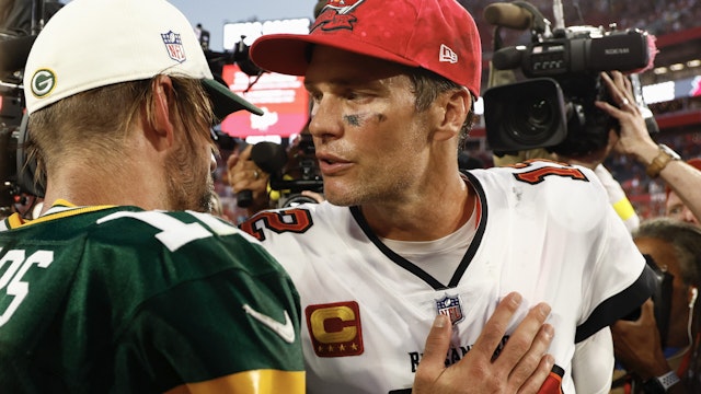 Aaron Rodgers #12 of the Green Bay Packers talks with Tom Brady #12 of the Tampa Bay Buccaneers after the game at Raymond James Stadium on September 25, 2022 in Tampa, Florida.