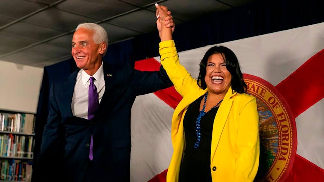 Charlie Crist, the Democratic Partyâs candidate for Florida governor, and his newly announced running mate, Karla Hernandez-Mats, react during a political rally at Hialeah Middle Community School on Aug. 27, 2022, in Hialeah, Florida.