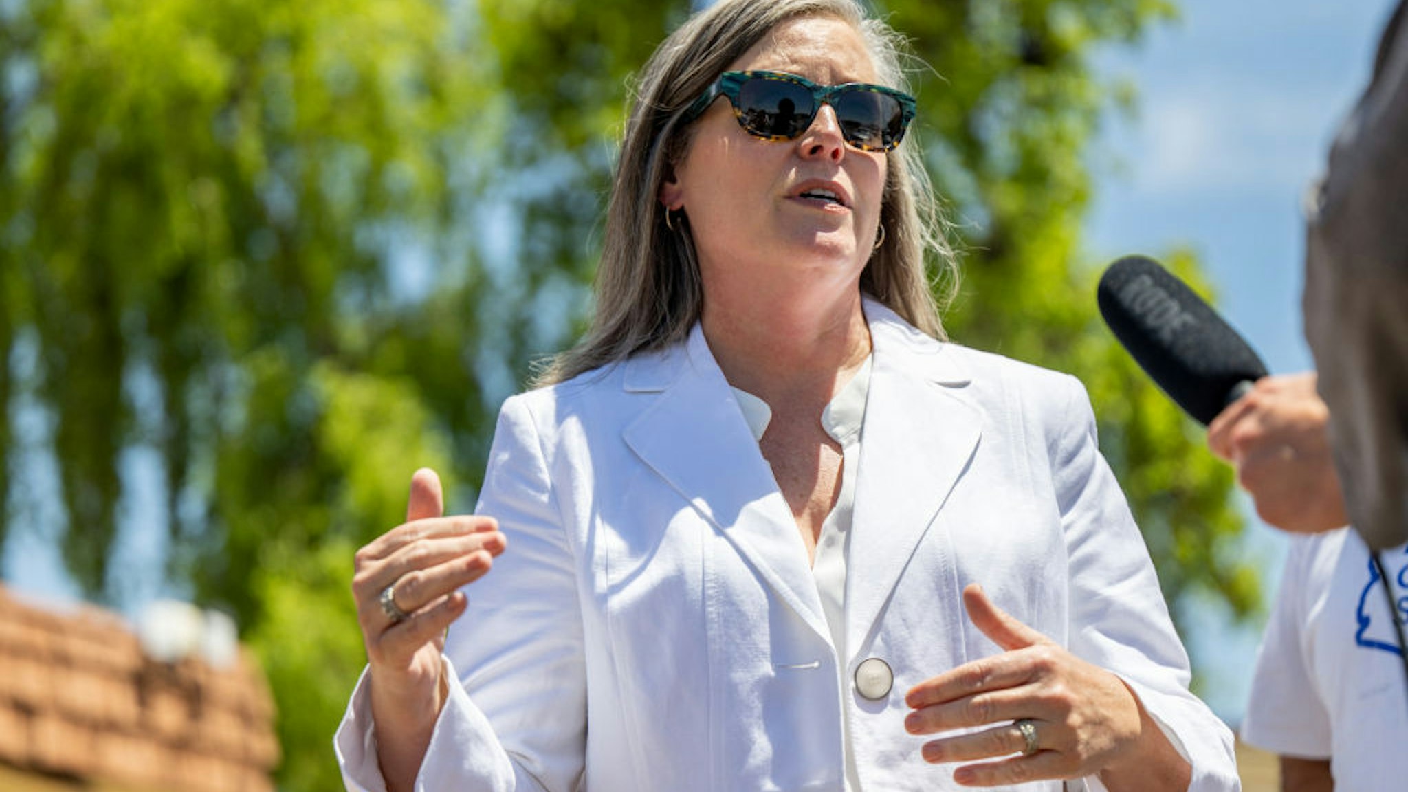 TOLLESON, ARIZONA - AUGUST 02: Arizona Secretary of State and candidate for governor Katie Hobbs speaks to reporters at a news conference on August 02, 2022 in Tolleson, Arizona. Hobbs is up against Republican gubernatorial candidate Kari Lake and lobbyist Karrin Taylor Robson in this year's primary. (Photo by Brandon Bell/Getty Images)