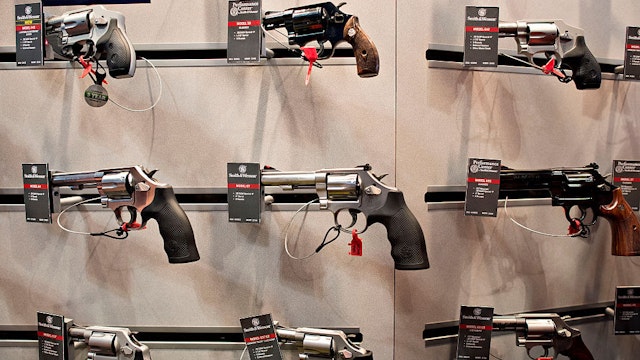 Revolvers sit on display in the Smith &amp; Wesson booth on the exhibition floor of the 144th National Rifle Association (NRA) Annual Meetings and Exhibits at the Music City Center in Nashville, Tennessee, U.S., on Saturday, April 11, 2015. Top Republican contenders for their party's 2016 presidential nomination are lining up to speak at the annual NRA event, except New Jersey Governor Chris Christie and Kentucky Senator Rand Paul, who were snubbed by the country's largest and most powerful gun lobby. Photographer: Daniel Acker/Bloomberg via Getty Images