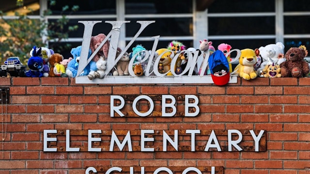 Mementos decorate a makeshift memorial for the shooting victims outside Robb Elementary School in Uvalde, Texas, on May 28, 2022