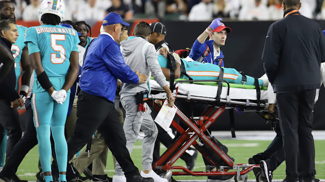 CINCINNATI, OH - SEPTEMBER 29: Miami Dolphins quarterback Tua Tagovailoa (1) is carted off the field after an injury in a game between the Miami Dolphins and the Cincinnati Bengals on September 29, 2022, at Paycor Stadium in Cincinnati, OH.
