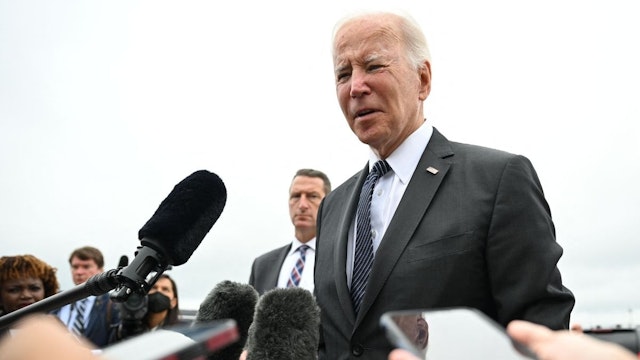 US President Joe Biden speaks with reporters before boarding Air Force One from Andrews Air Force Base in Maryland on September 12, 2022.