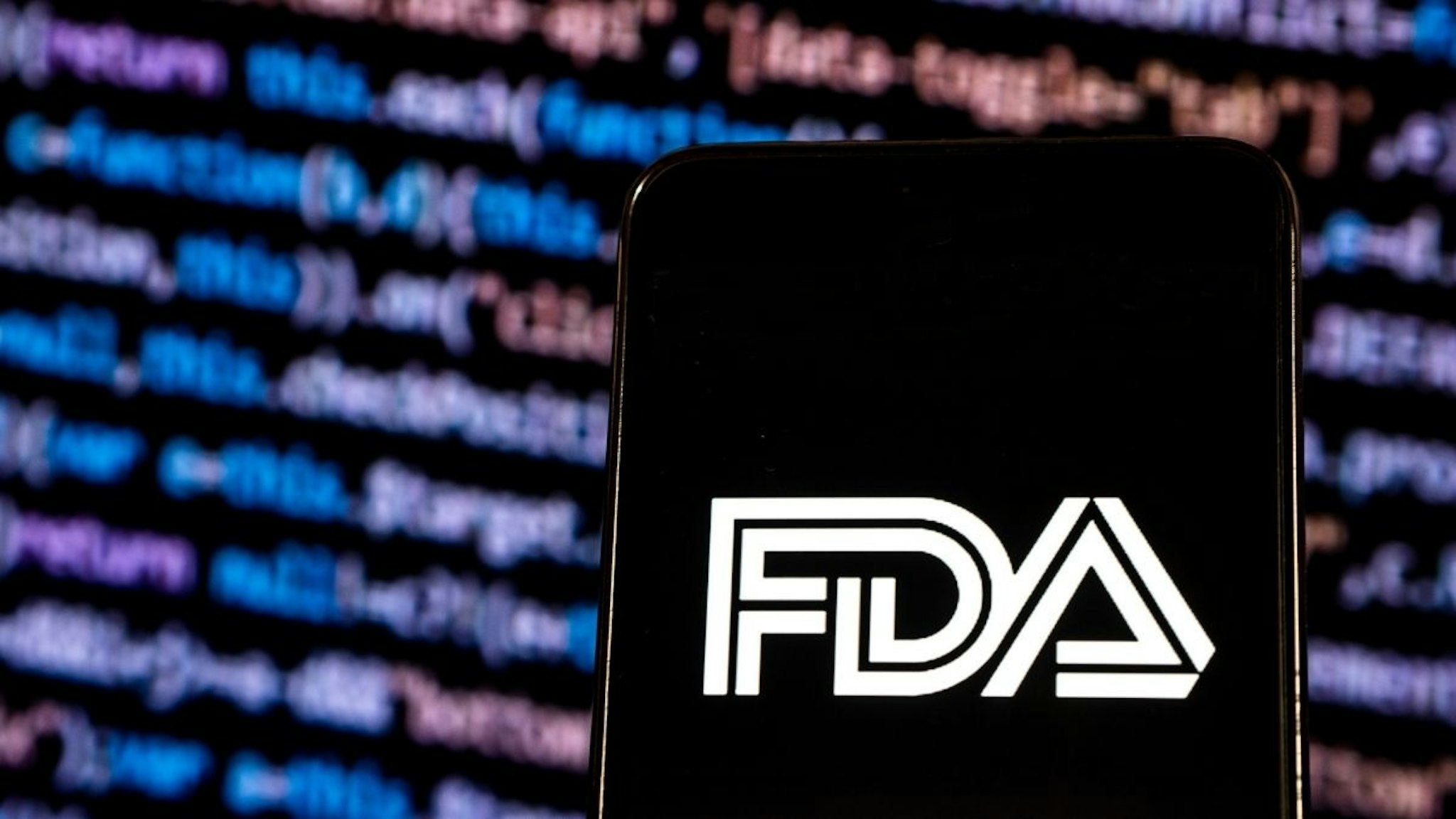 In this photo illustration, the Food and Drug Administration Federal agency logo seen displayed on a smartphone.