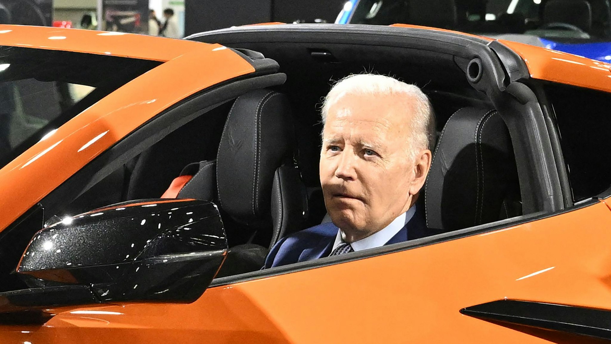 US President Joe Biden sits in a Chevrolet Corvette Z06 as he tours the 2022 North American International Auto Show at Huntington Place Convention Center in Detroit, Michigan on September 14, 2022.