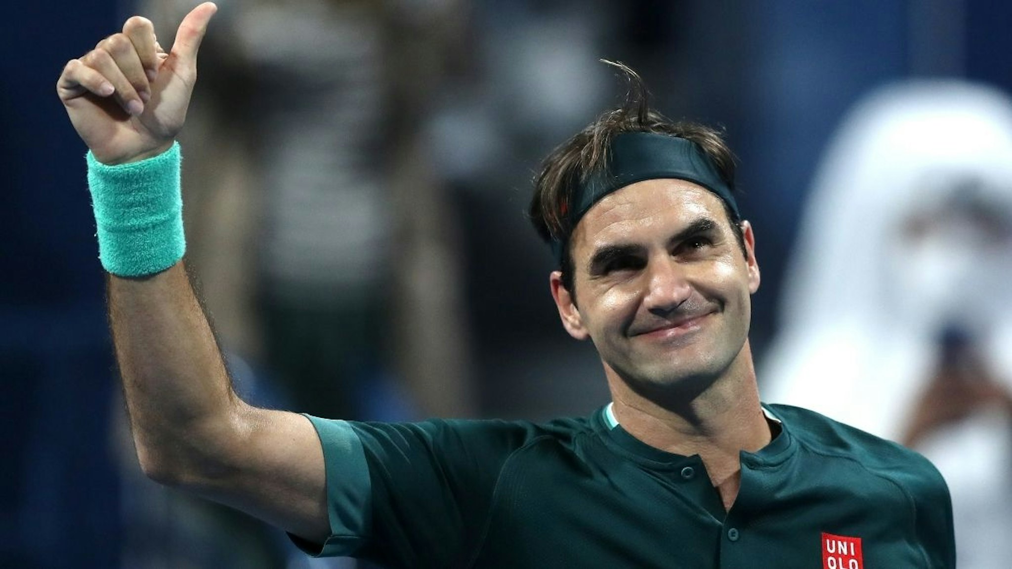 Roger Federer of Switzerland celebrates winning his match against Dan Evans of Great Britain on Day 3 of the Qatar ExxonMobil Open at Khalifa International Tennis and Squash Complex on March 10, 2021 in Doha, Qatar.