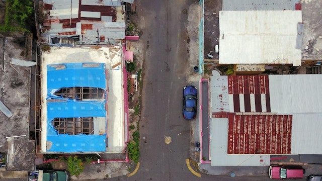 The blue tarp that was used to protect the roof damaged by Hurricane Maria two years ago is showing wear and tear in San Juan, Puerto Rico, September 18, 2019.