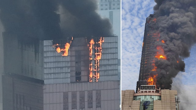 CHANGSHA, CHINA - SEPTEMBER 16: Flames and smoke rise from a 218-meter-tall office building on September 16, 2022 in Changsha, Hunan Province of China. A major fire broke out in the skyscraper in Changsha city on Friday afternoon. No casualties have been reported so far.