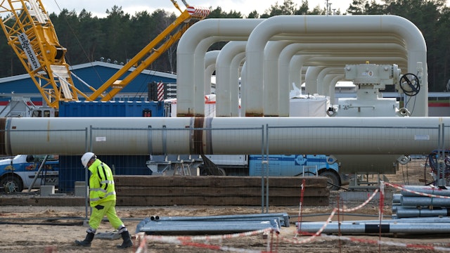 LUBMIN, GERMANY - MARCH 26: A workers walks past pipes at the construction site of the facility that will be on the receiving end of the Nord Stream 2 natural gas pipeline on March 26, 2019 in Lubmin, Germany. The two-pronged Nord Stream 2 pipeline will transport natural gas from Russia 1230km through the Baltic Sea to Germany.